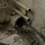 dismantling a cast iron pipe