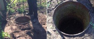 Pit toilet made from a barrel